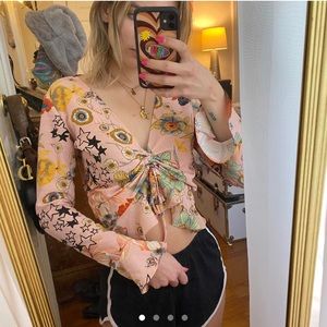 Topshop pink top with multi color flower and star prints